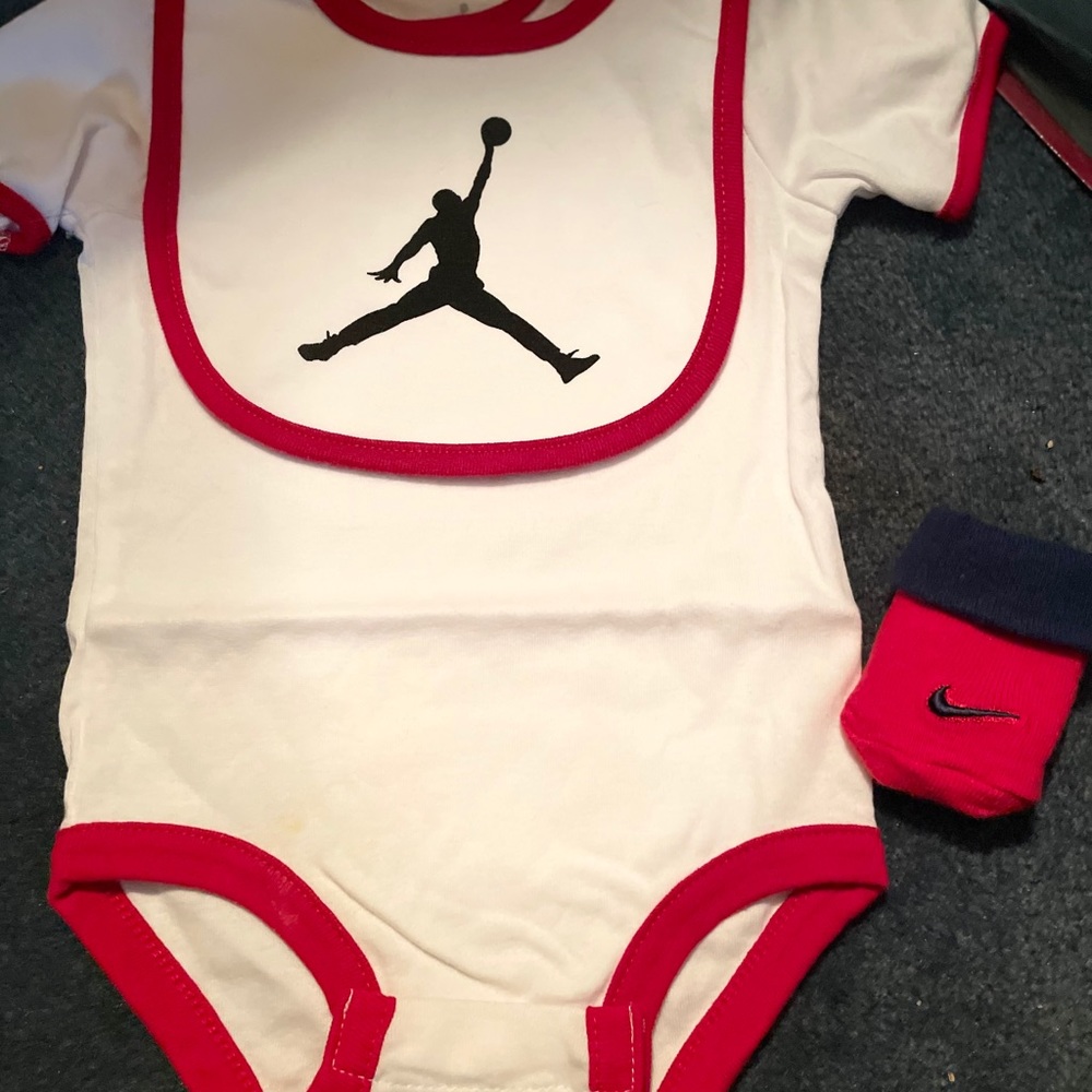 Jordan three piece onesie set. New without tags